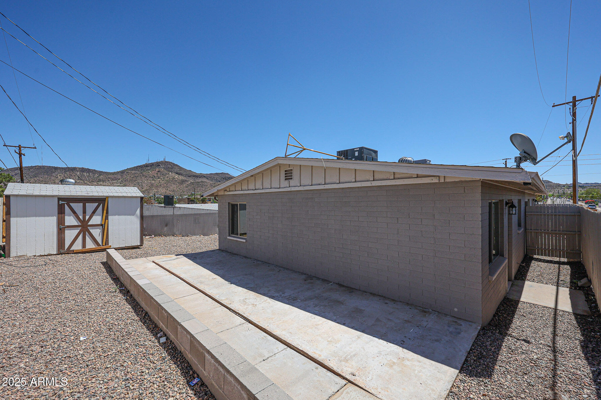 10202 North 15th Avenue, Unit 2 Phoenix, AZ 85021 - Photo 29 of 34 a view of a house with a roof deck