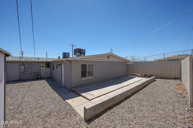 a view of balcony with two chairs