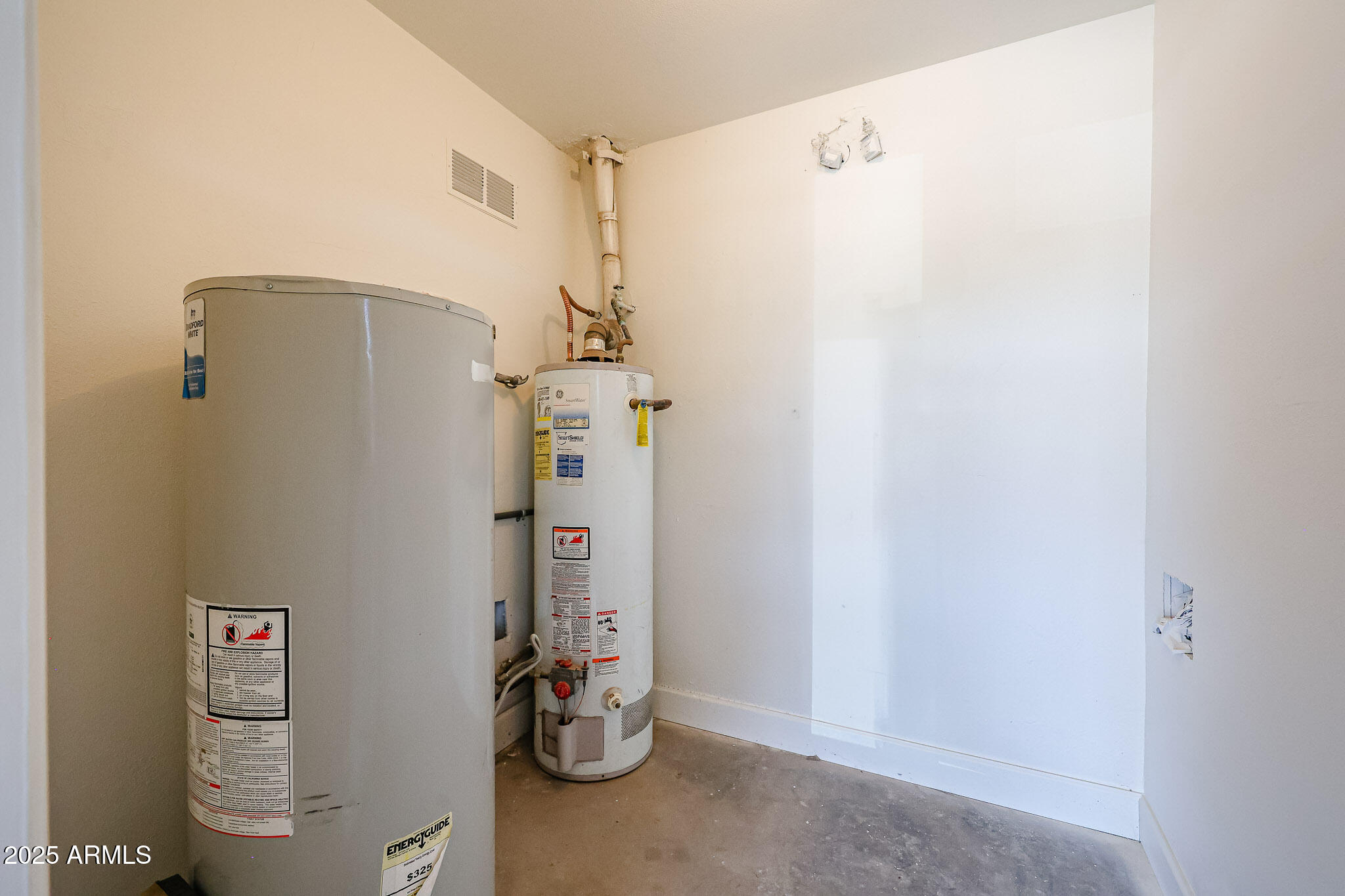 10202 North 15th Avenue, Unit 2 Phoenix, AZ 85021 - Photo 6 of 34 a view of water heater room