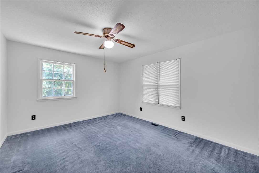 952 Stephens Drive Westminster, SC 29693 - Photo 34 of 50 Bedroom with dual windows and a ceiling fan for optimal comfort.