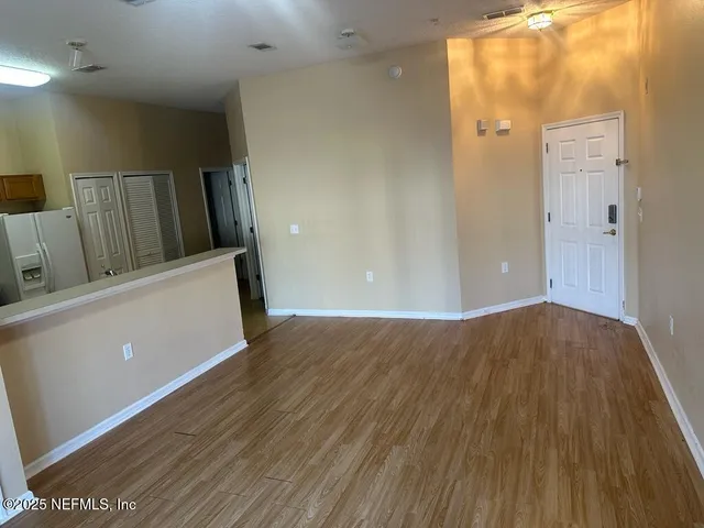 wooden floor and windows in a room