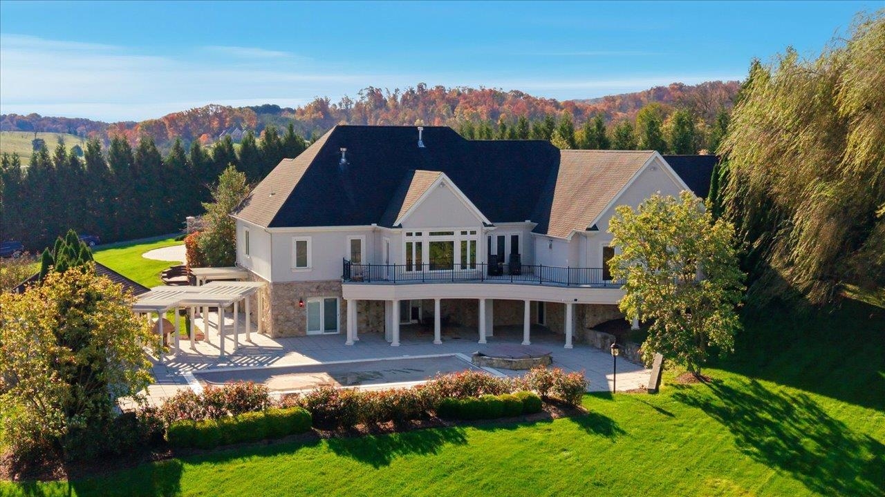 2223 Airport Road Bridgewater, VA 22812 - Photo 2 of 74 a aerial view of a house with a big yard plants and large trees