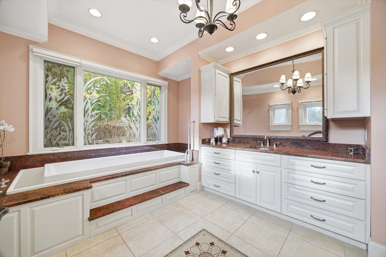 2223 Airport Road Bridgewater, VA 22812 - Photo 26 of 74 a bathroom with a large tub sink and large windows