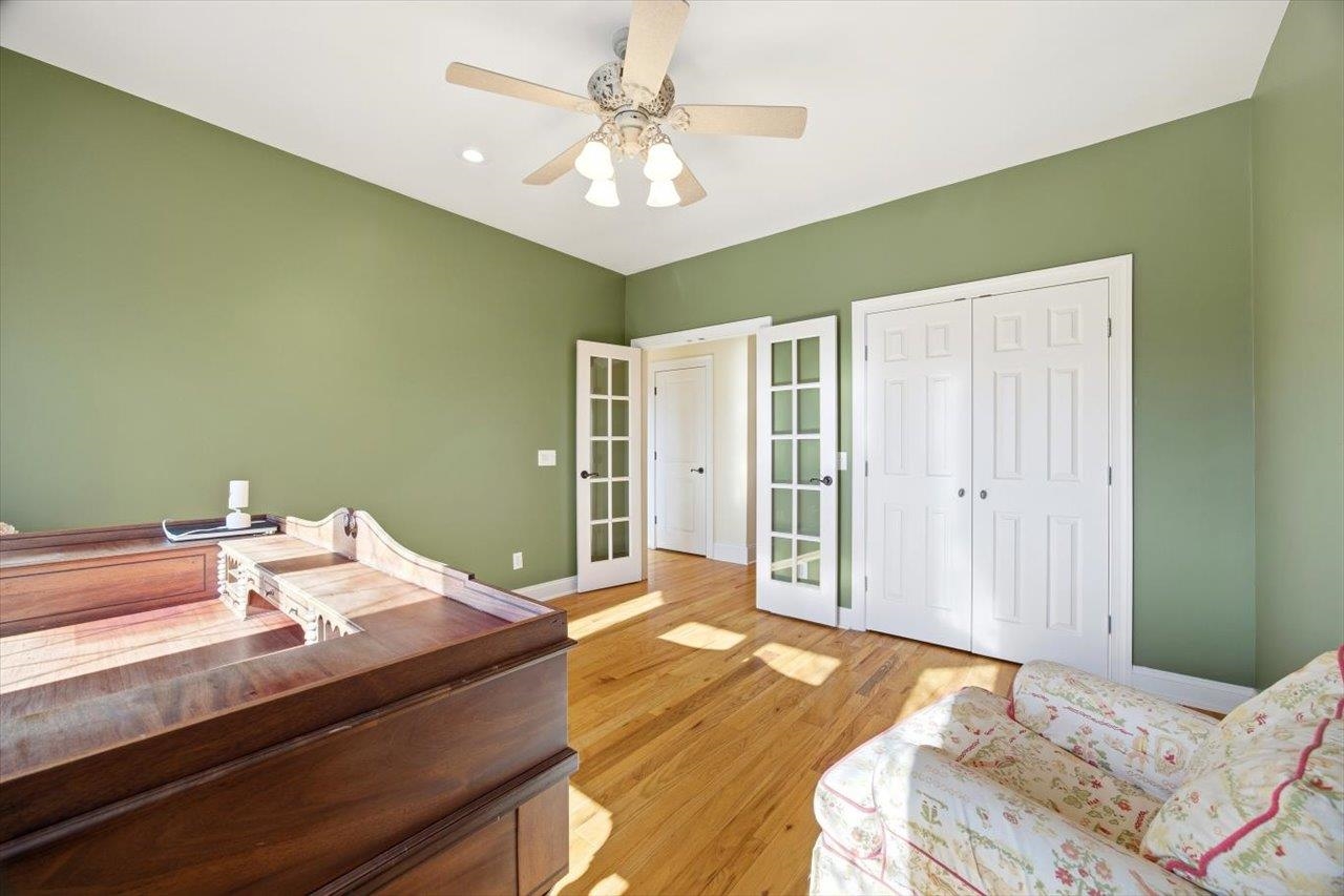 2223 Airport Road Bridgewater, VA 22812 - Photo 31 of 74 a bedroom with a bed and a chandelier