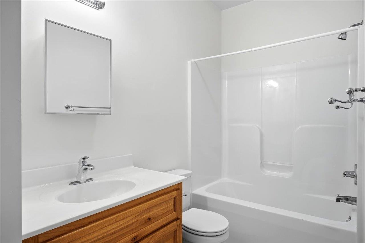 2223 Airport Road Bridgewater, VA 22812 - Photo 53 of 74 a bathroom with a sink a toilet and shower