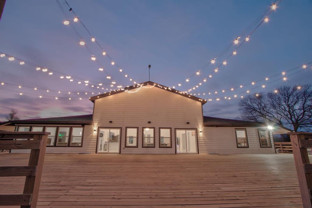550 County Road 297 Gainesville, TX 76240 - Photo 22 of 24 a view of a patio yard and a patio with a table