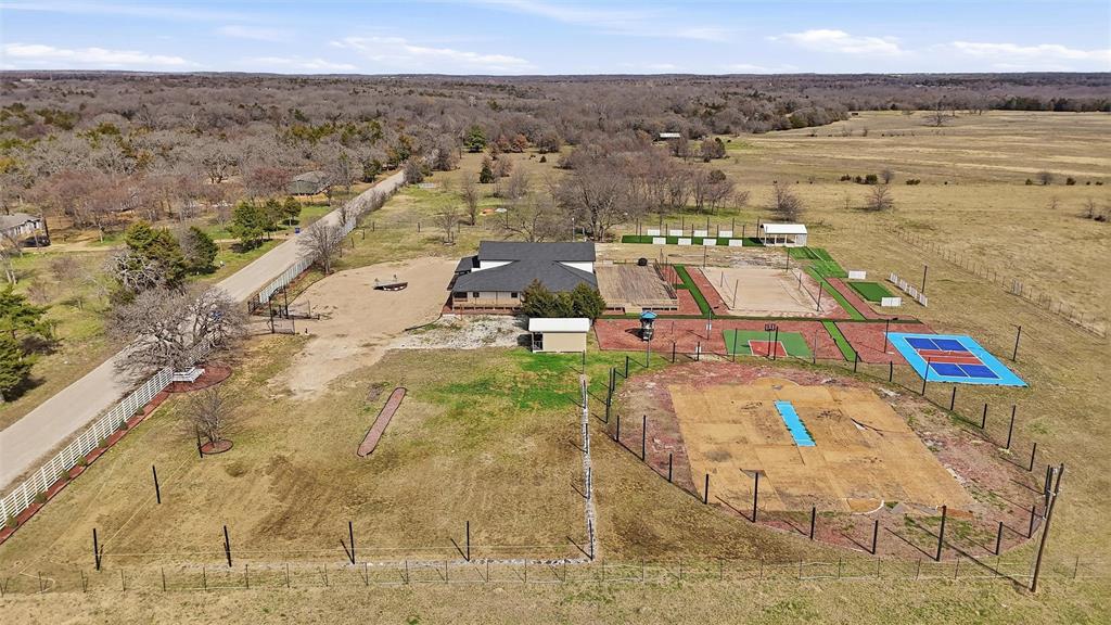 550 County Road 297 Gainesville, TX 76240 - Photo 30 of 40 an aerial view of residential houses with outdoor space