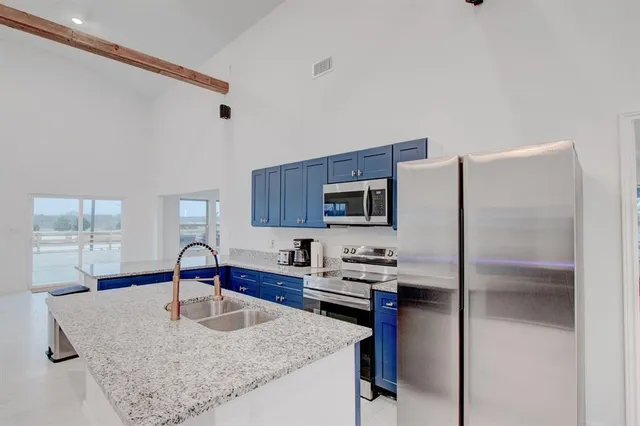 a bedroom with furniture and window