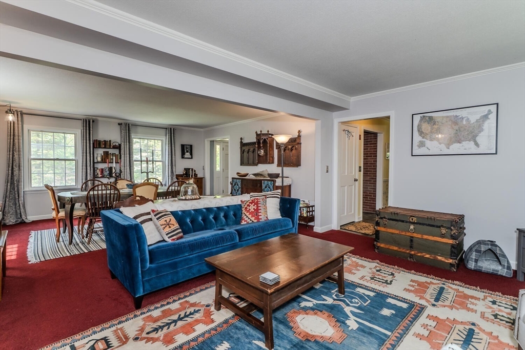 87 Montague Road Westhampton, MA 01027 - Photo 12 of 42 a living room with furniture rug and wooden floor