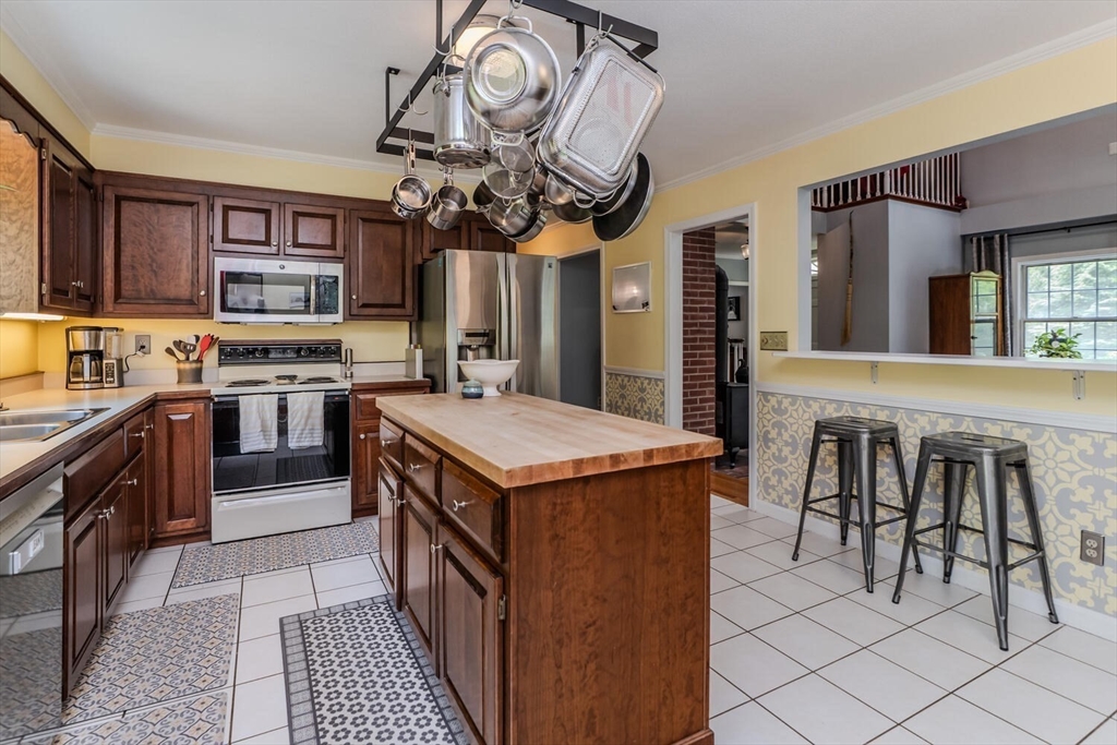 87 Montague Road Westhampton, MA 01027 - Photo 16 of 42 a kitchen with stainless steel appliances granite countertop a stove and cabinets