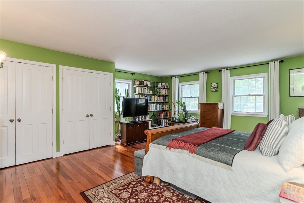 87 Montague Road Westhampton, MA 01027 - Photo 22 of 42 a bedroom with a bed furniture and a window