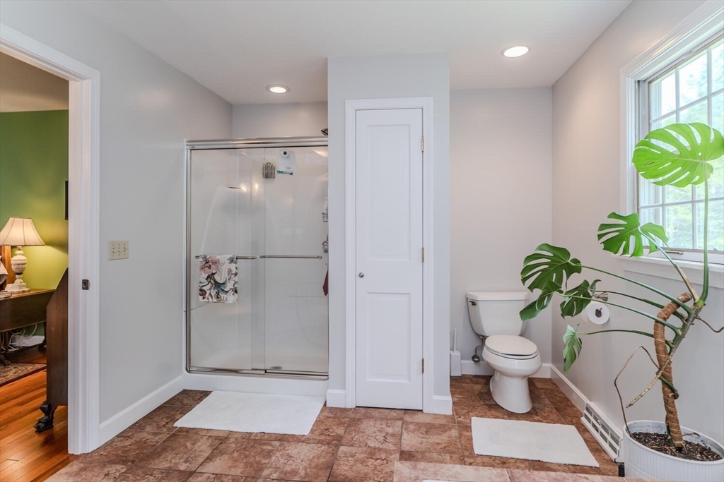 87 Montague Road Westhampton, MA 01027 - Photo 26 of 42 a bathroom with a toilet and a shower