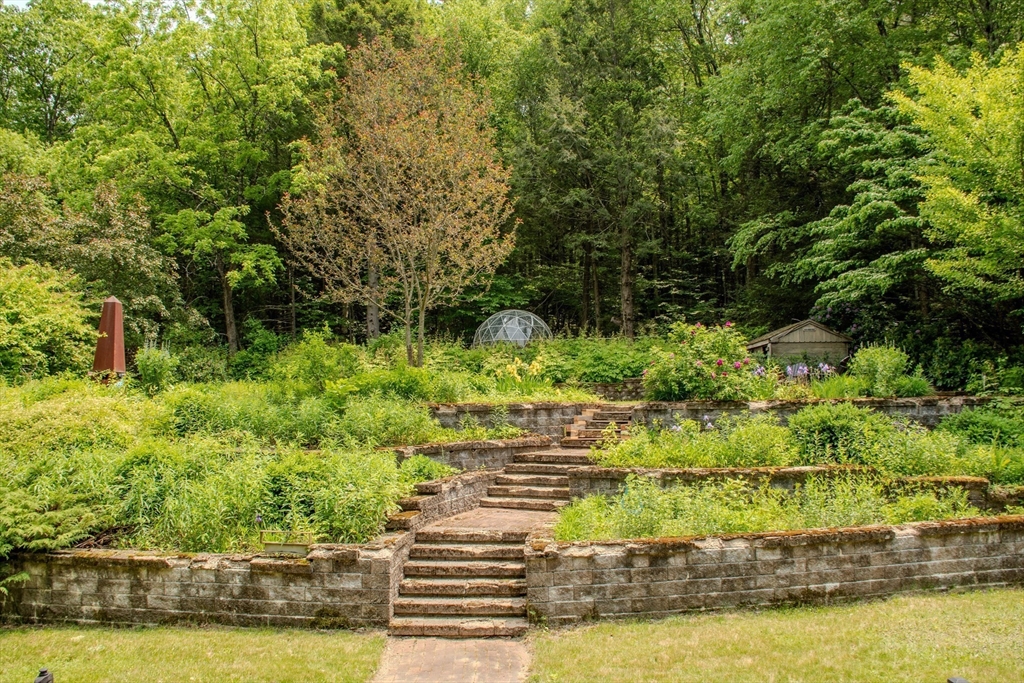 87 Montague Road Westhampton, MA 01027 - Photo 30 of 42 a view of a garden with large trees