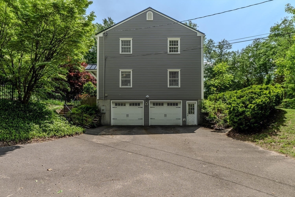 87 Montague Road Westhampton, MA 01027 - Photo 32 of 42 a front view of a house with a yard