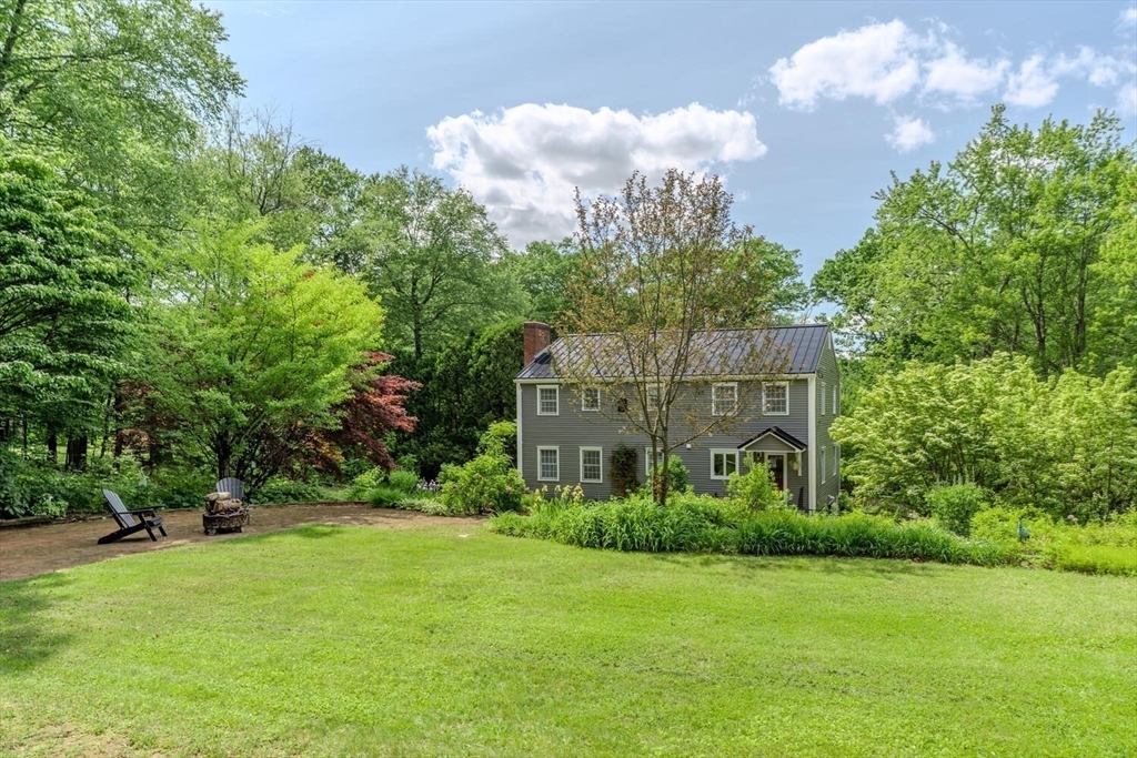 87 Montague Road Westhampton, MA 01027 - Photo 36 of 42 a view of a big yard with plants and large trees