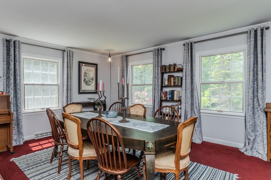 87 Montague Road Westhampton, MA 01027 - Photo 9 of 42 a view of a dining room with furniture window and wooden floor