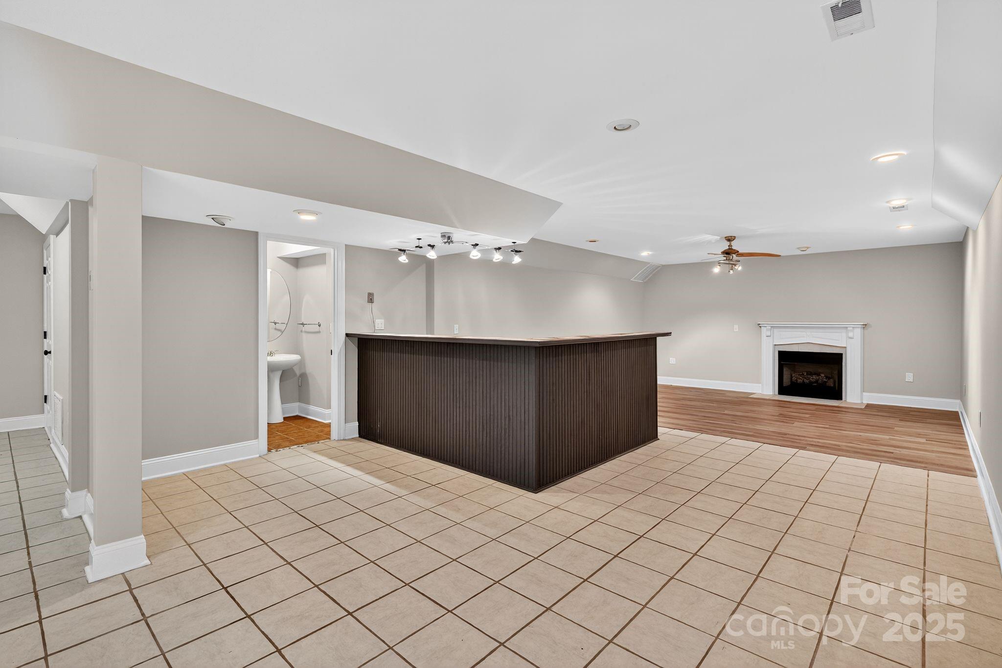 1000 Potters Bluff Road Monroe, NC 28110 - Photo 12 of 20 a view of a hallway with closet and a fireplace