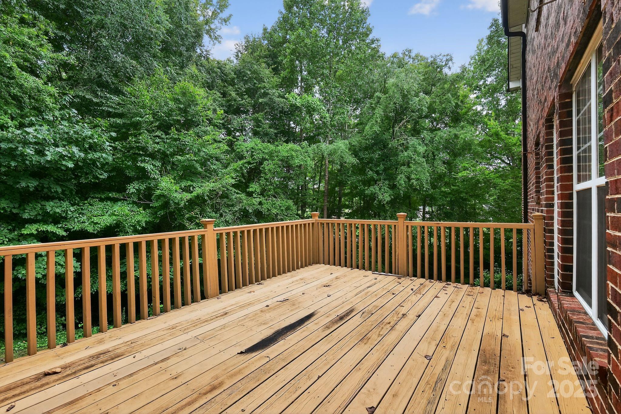 1000 Potters Bluff Road Monroe, NC 28110 - Photo 17 of 20 a view of balcony with wooden floor and fence