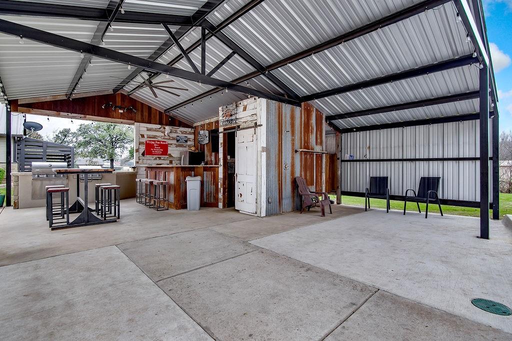 3817 Cross Timber Road Burleson, TX 76028 - Photo 12 of 36 a view of a garage with furniture