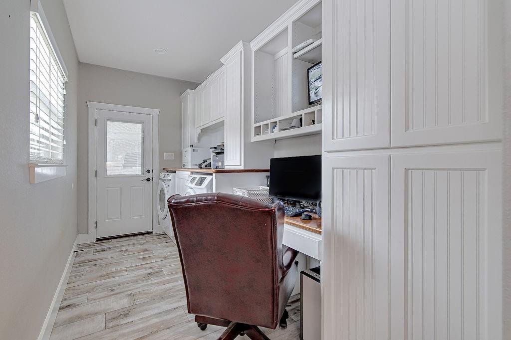 3817 Cross Timber Road Burleson, TX 76028 - Photo 13 of 36 a kitchen with stainless steel appliances a stove top oven and cabinets