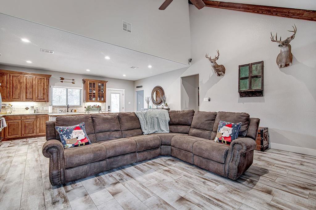 3817 Cross Timber Road Burleson, TX 76028 - Photo 20 of 36 a living room with furniture and a flat screen tv