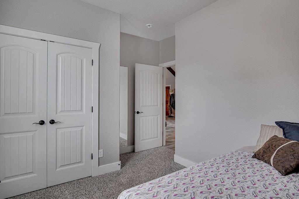 3817 Cross Timber Road Burleson, TX 76028 - Photo 28 of 36 a bedroom with a bed and a closet