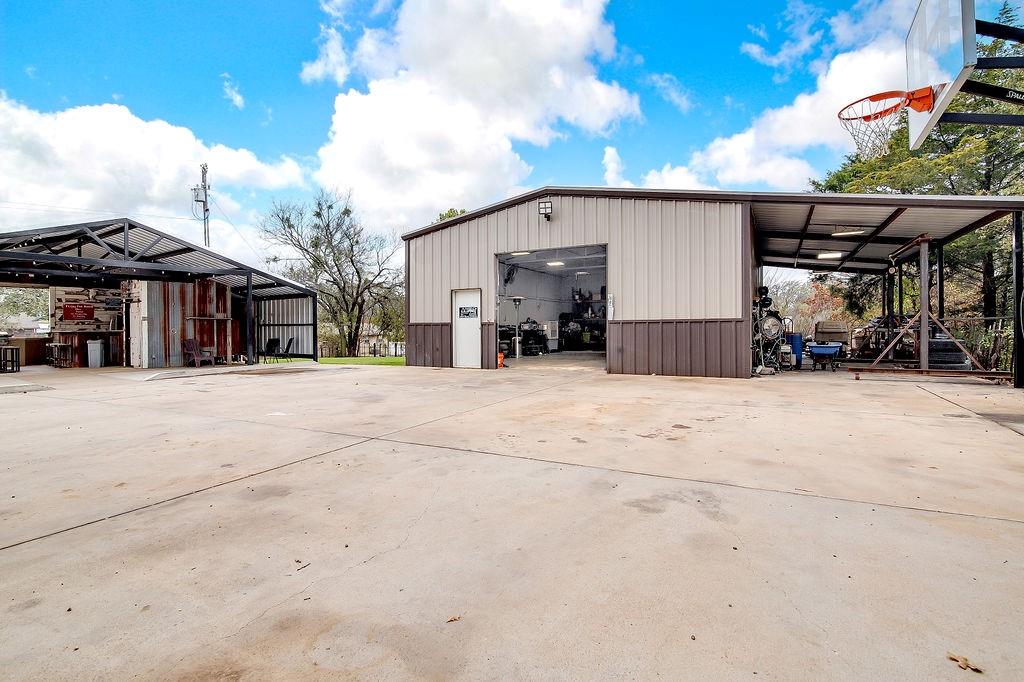 3817 Cross Timber Road Burleson, TX 76028 - Photo 5 of 36 a view of a house with a snow in the yard