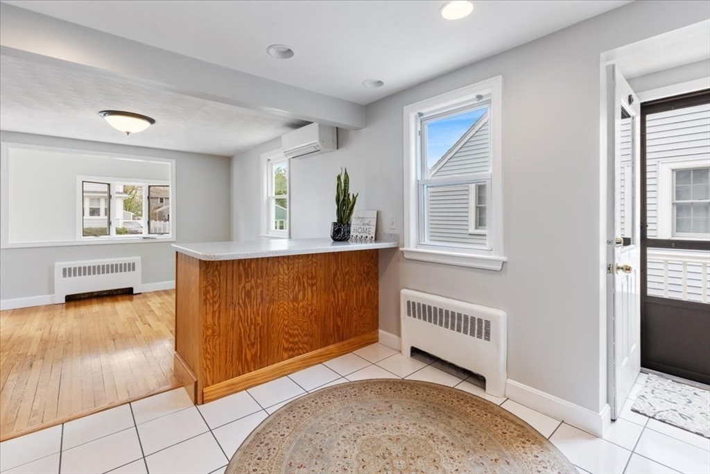 7 G Street Hull, MA 02045 - Photo 13 of 34 a view of a bedroom with window and furniture