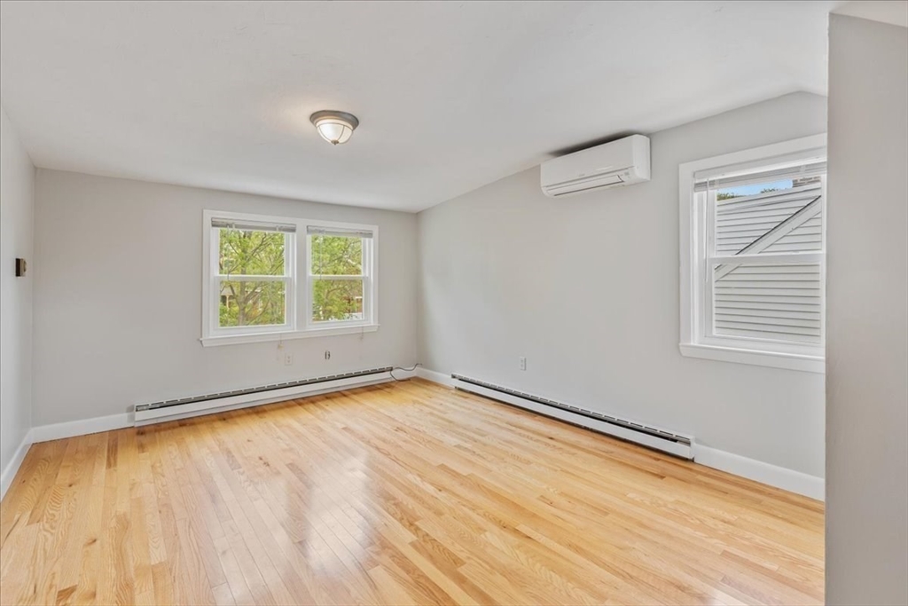 7 G Street Hull, MA 02045 - Photo 20 of 34 a view of an empty room with a window