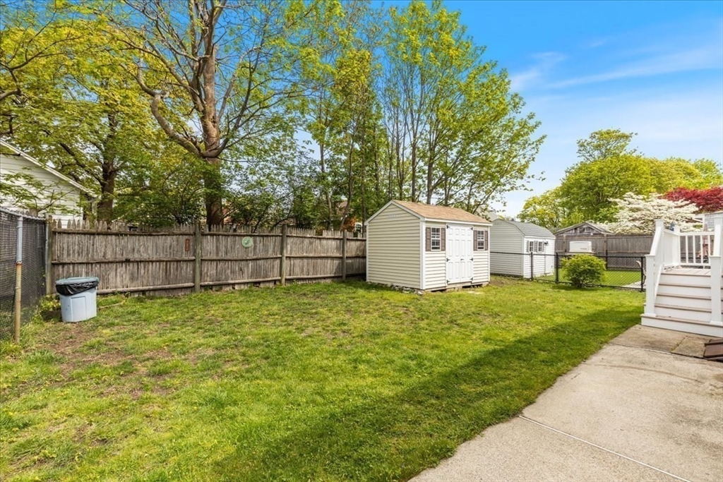 7 G Street Hull, MA 02045 - Photo 23 of 34 a white house that has tree in front of it