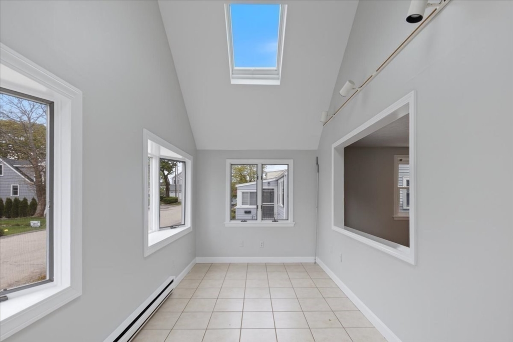 7 G Street Hull, MA 02045 - Photo 7 of 34 an empty room with windows