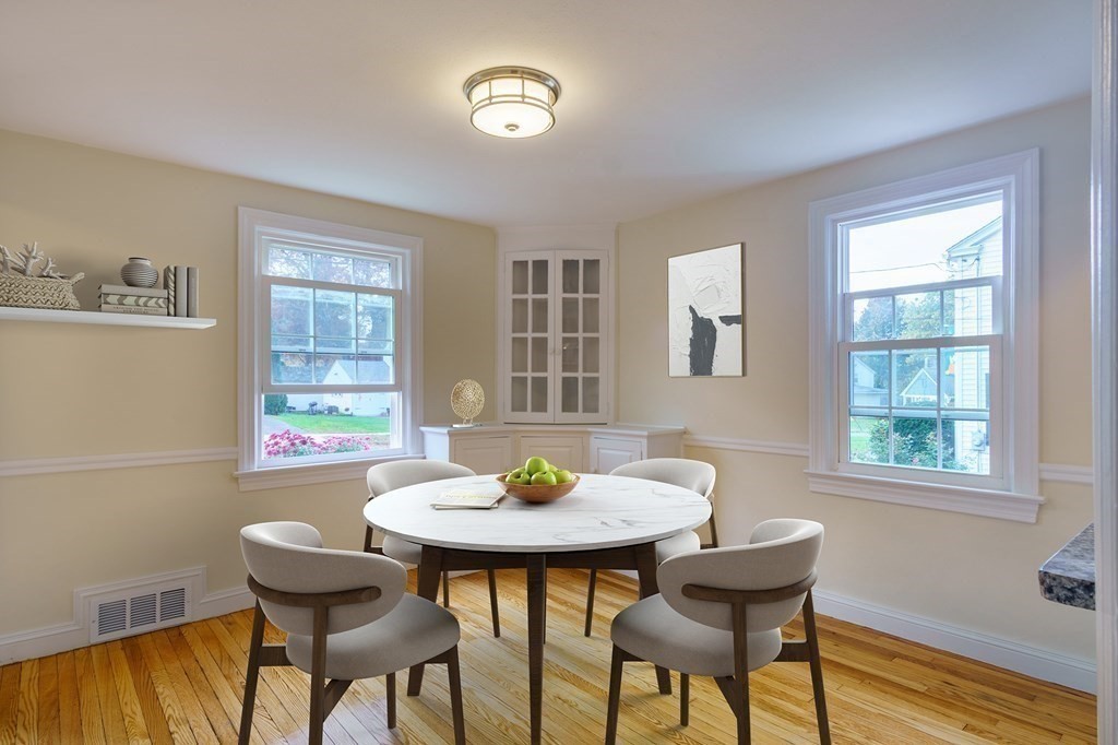 90 Hartwick Street Springfield, MA 01108 - Photo 12 of 33 a view of a dining room with furniture window and wooden floor