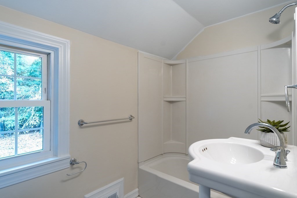 90 Hartwick Street Springfield, MA 01108 - Photo 15 of 33 a bathroom with a sink and a bathtub