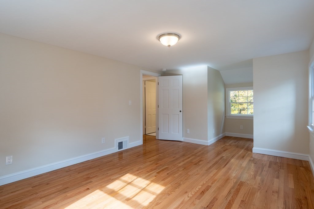 90 Hartwick Street Springfield, MA 01108 - Photo 17 of 33 a view of empty room with wooden floor
