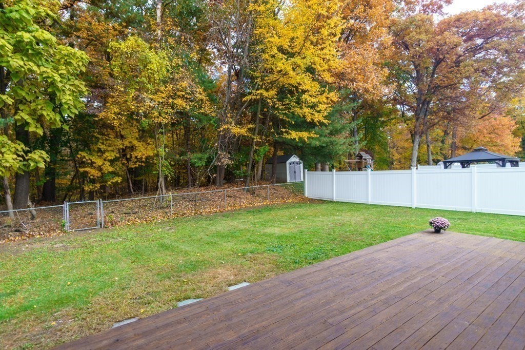 90 Hartwick Street Springfield, MA 01108 - Photo 28 of 33 a view of a backyard with large trees
