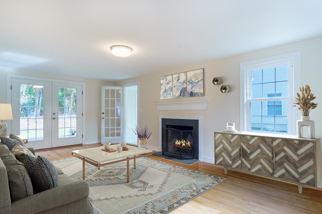 90 Hartwick Street Springfield, MA 01108 - Photo 3 of 33 a living room with furniture and a fireplace