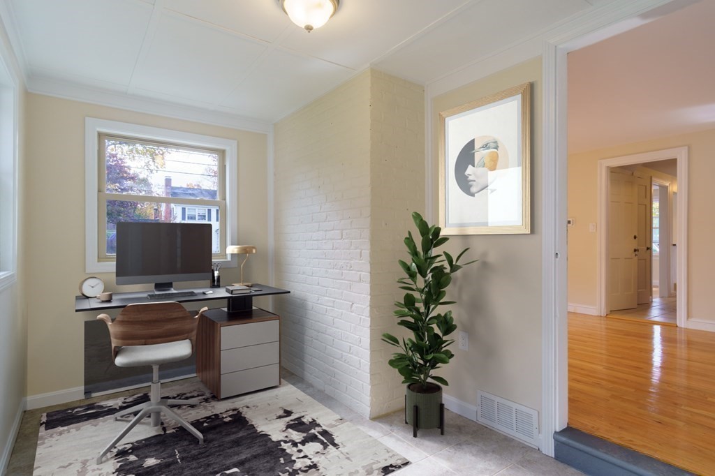 90 Hartwick Street Springfield, MA 01108 - Photo 6 of 33 a workspace with furniture and a potted plant
