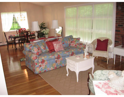 25 Linda Road Andover, MA 01810 - Photo 2 of 8 a living room with furniture and a large window