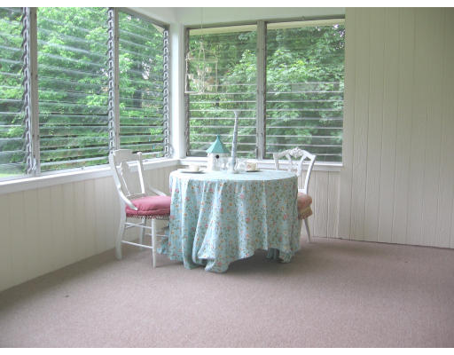 25 Linda Road Andover, MA 01810 - Photo 6 of 8 a view of a room with a table and chairs