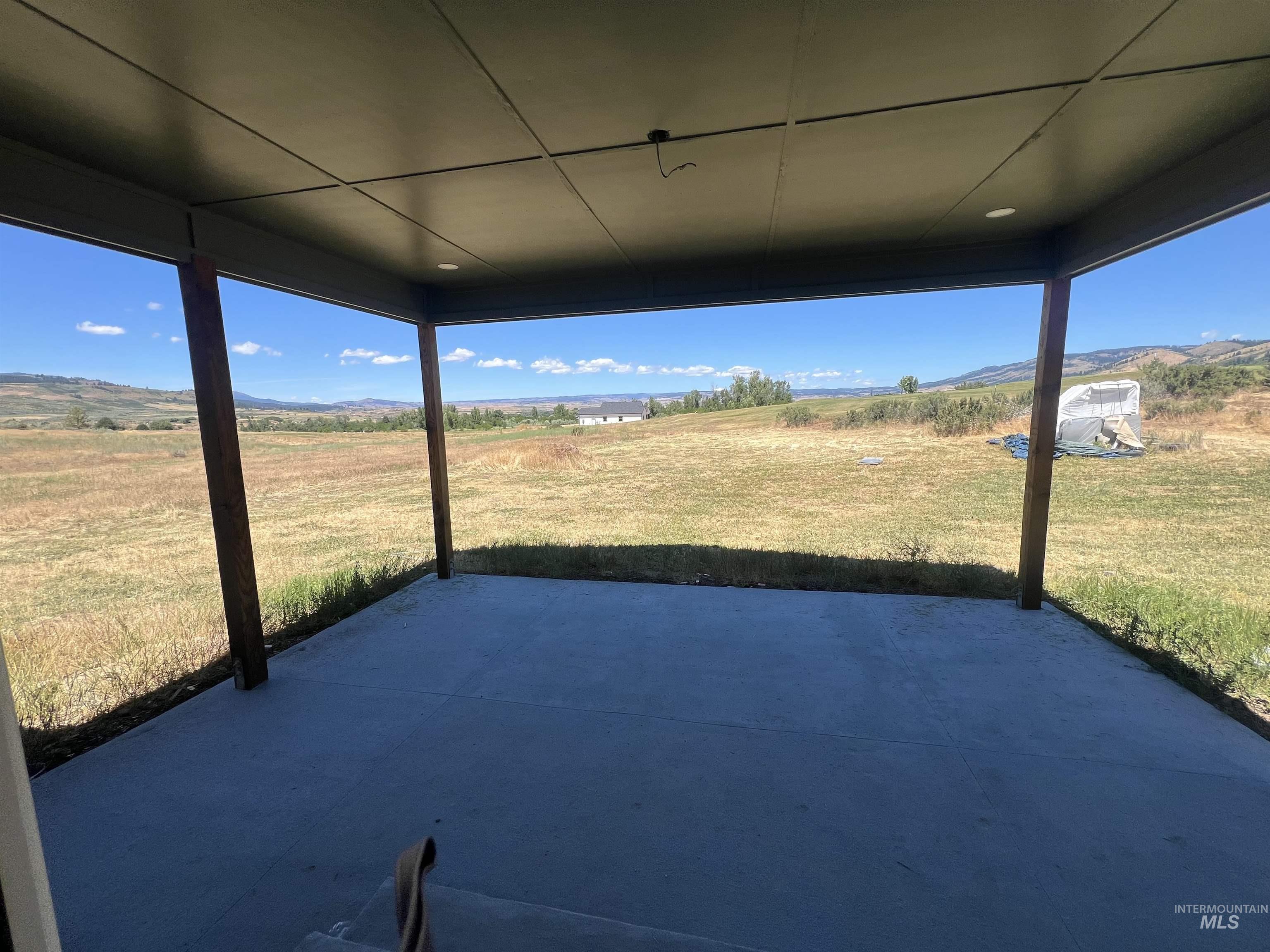 2300 Golf Council, ID 83612 - Photo 11 of 17 Covered concrete patio featuring recessed lighting and robust wood support posts