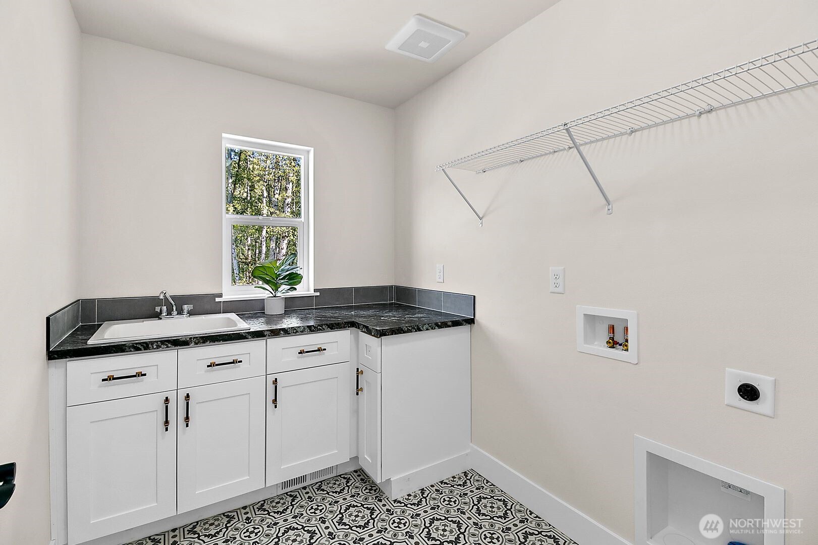 0 Herron Road Northwest Lakebay, WA 98349 - Photo 15 of 24 a kitchen with a sink and cabinets