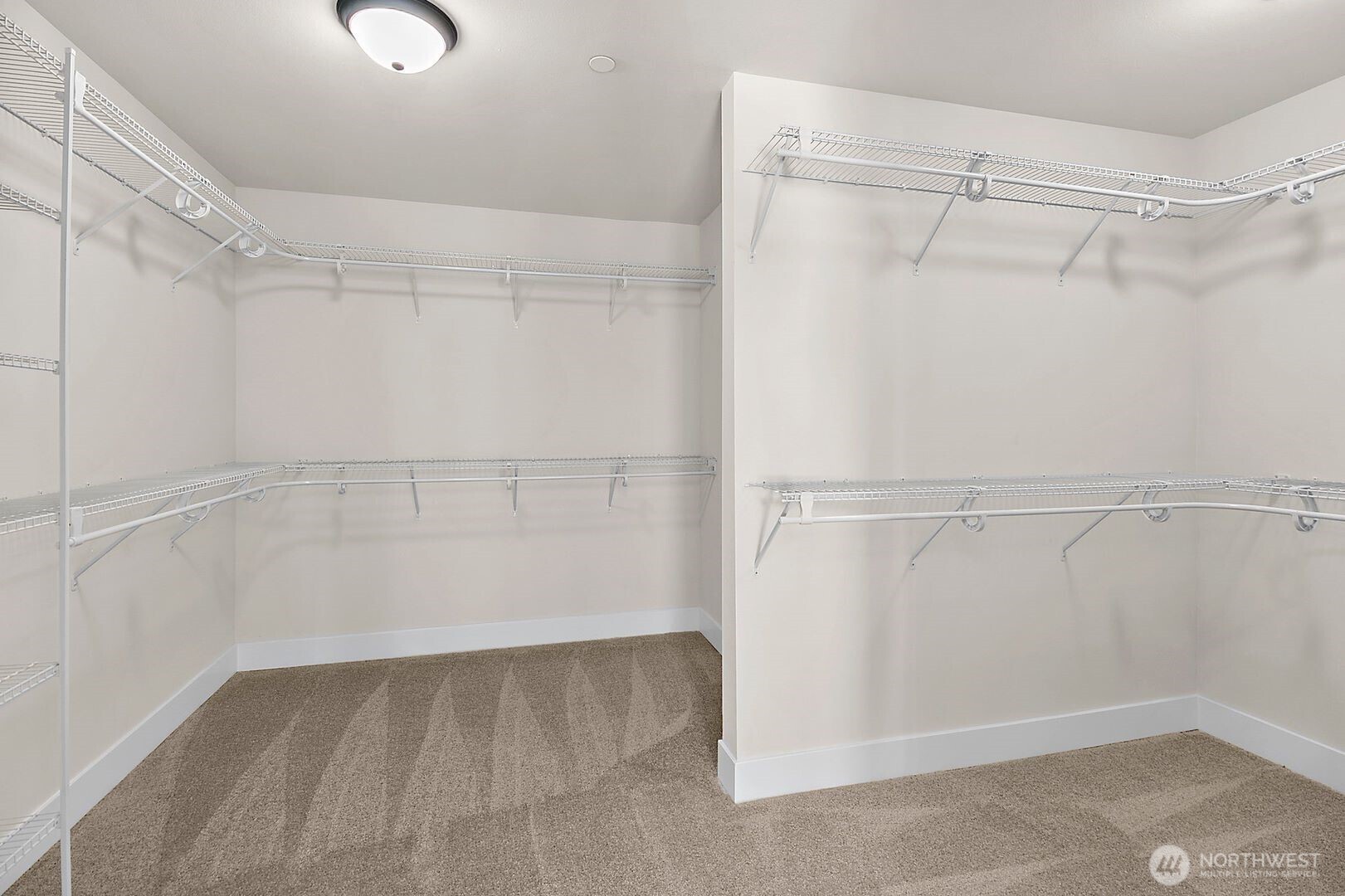 0 Herron Road Northwest Lakebay, WA 98349 - Photo 19 of 24 a view of a room with racks on the wall