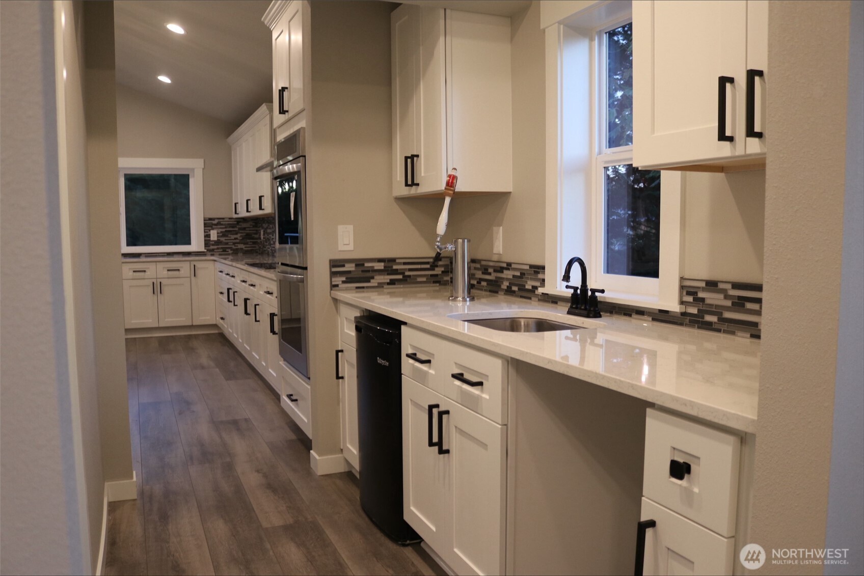 0 Herron Road Northwest Lakebay, WA 98349 - Photo 24 of 24 a kitchen with stainless steel appliances granite countertop a sink stove and refrigerator