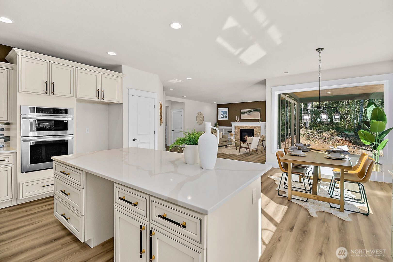 0 Herron Road Northwest Lakebay, WA 98349 - Photo 6 of 24 a open kitchen with stainless steel appliances granite countertop a stove and a refrigerator