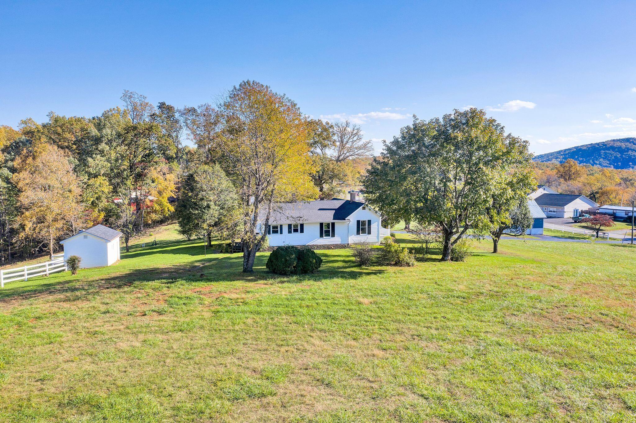 12558 Hardy Road Hardy, VA 24101 - Photo 12 of 14 a house with swimming pool in front of it