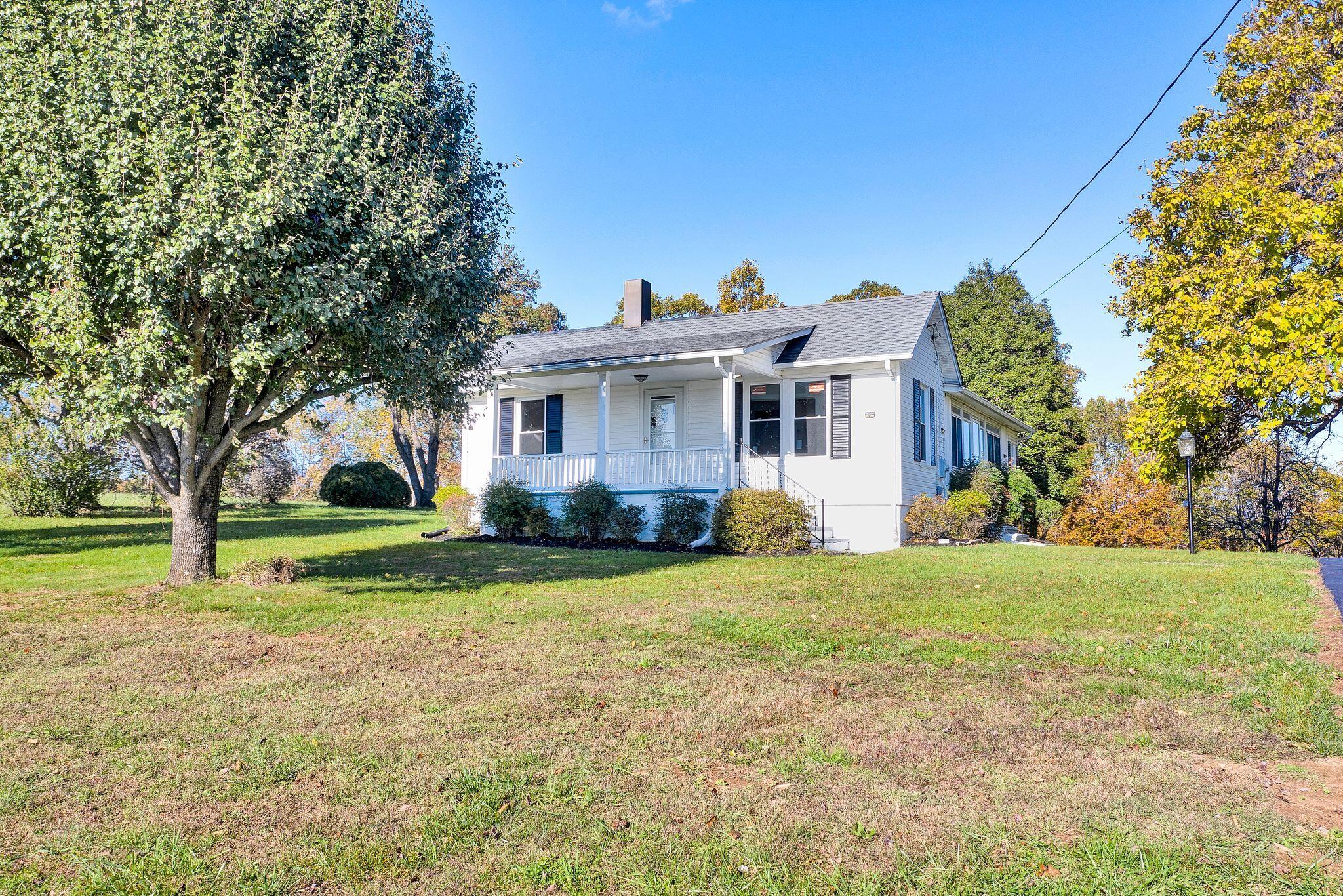 12558 Hardy Road Hardy, VA 24101 - Photo 3 of 14 a view of a house with a yard