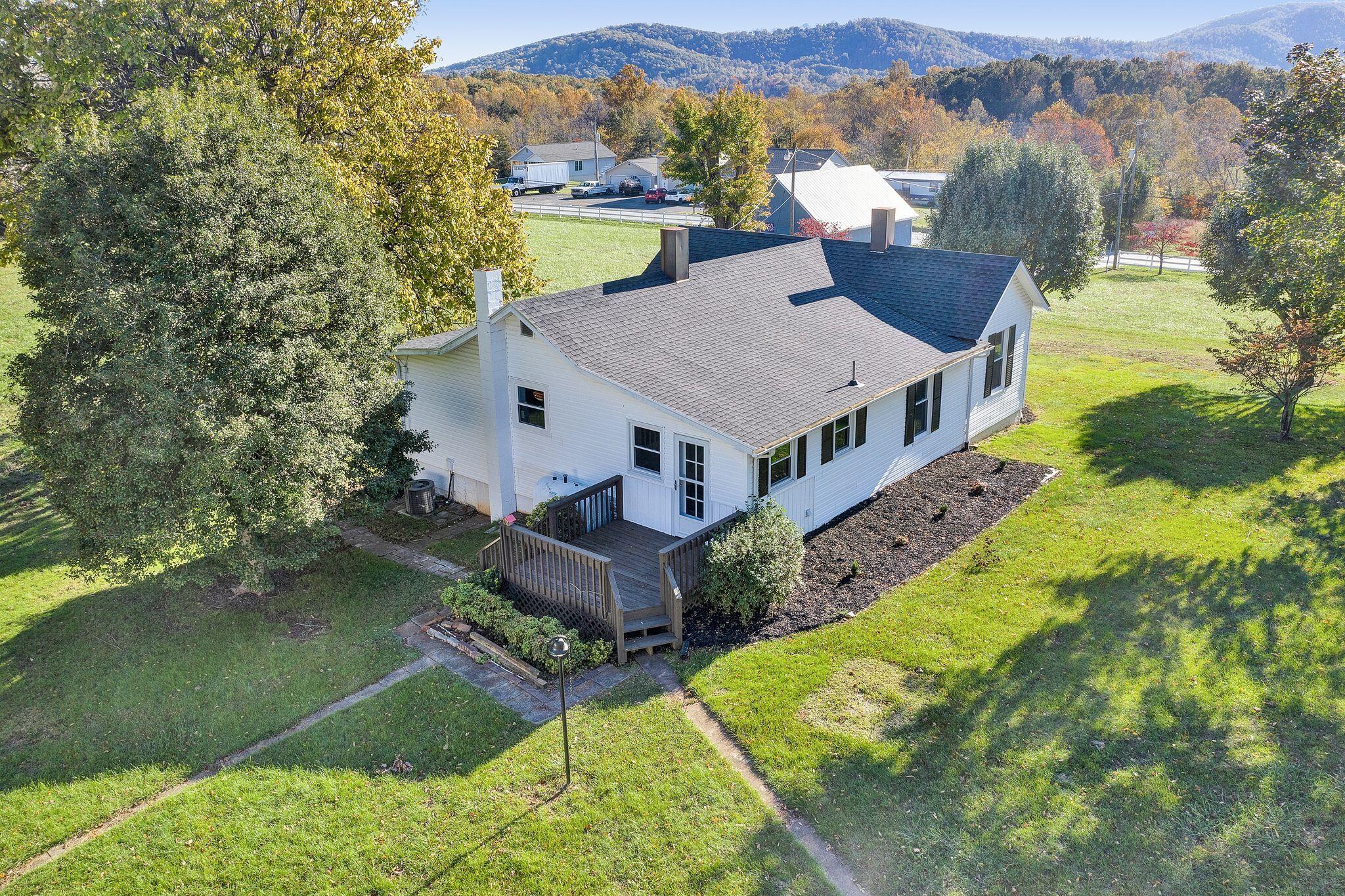 12558 Hardy Road Hardy, VA 24101 - Photo 8 of 14 a aerial view of a house with a yard