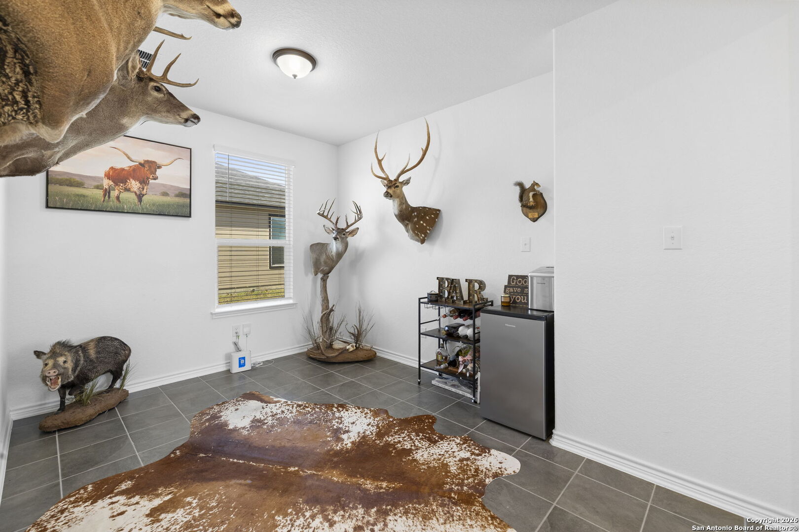 4931 Park Marion, TX 78124 - Photo 14 of 20 a view of a workspace with furniture and a window