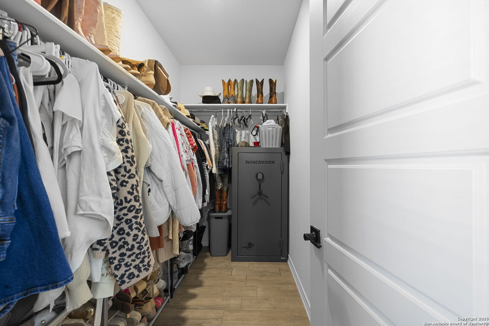 4931 Park Marion, TX 78124 - Photo 10 of 20 a view of walk in closet with clothes and shoes