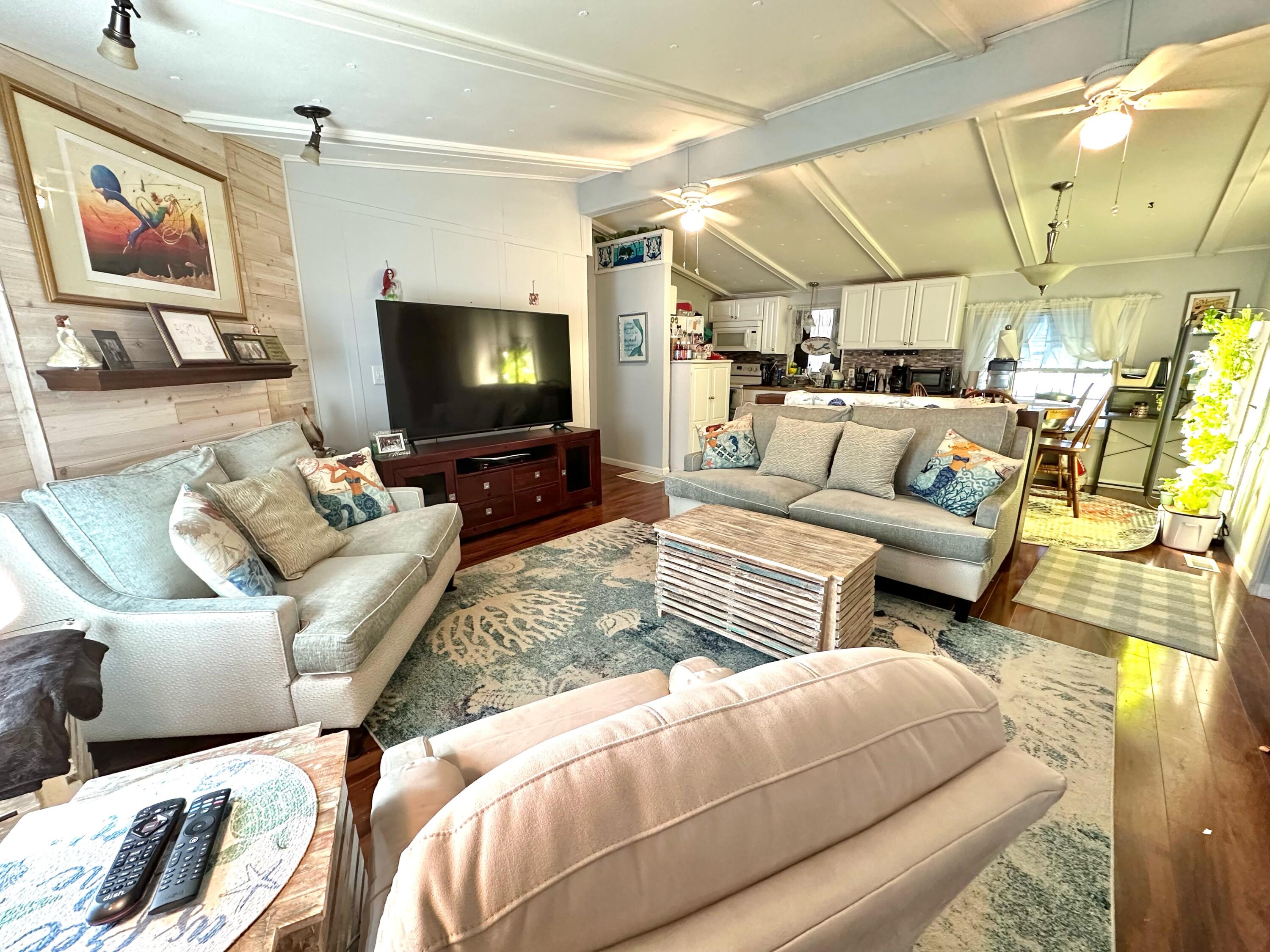 231 Southeast Paradise Place Stuart, FL 34997 - Photo 11 of 12 Living Room 2